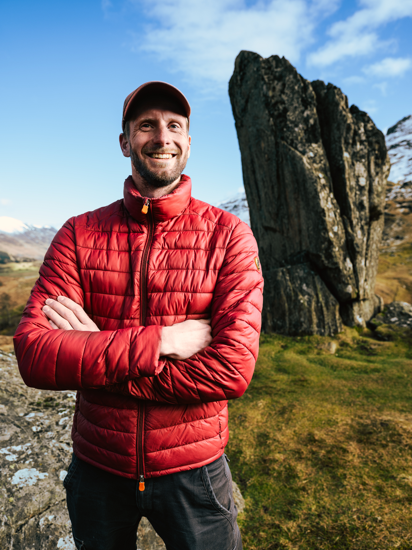 Cas Scharn smiling in the mountains